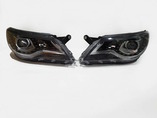 Volkswagen Tiguan линзованные фары с ДХО в стиле рестайлинга